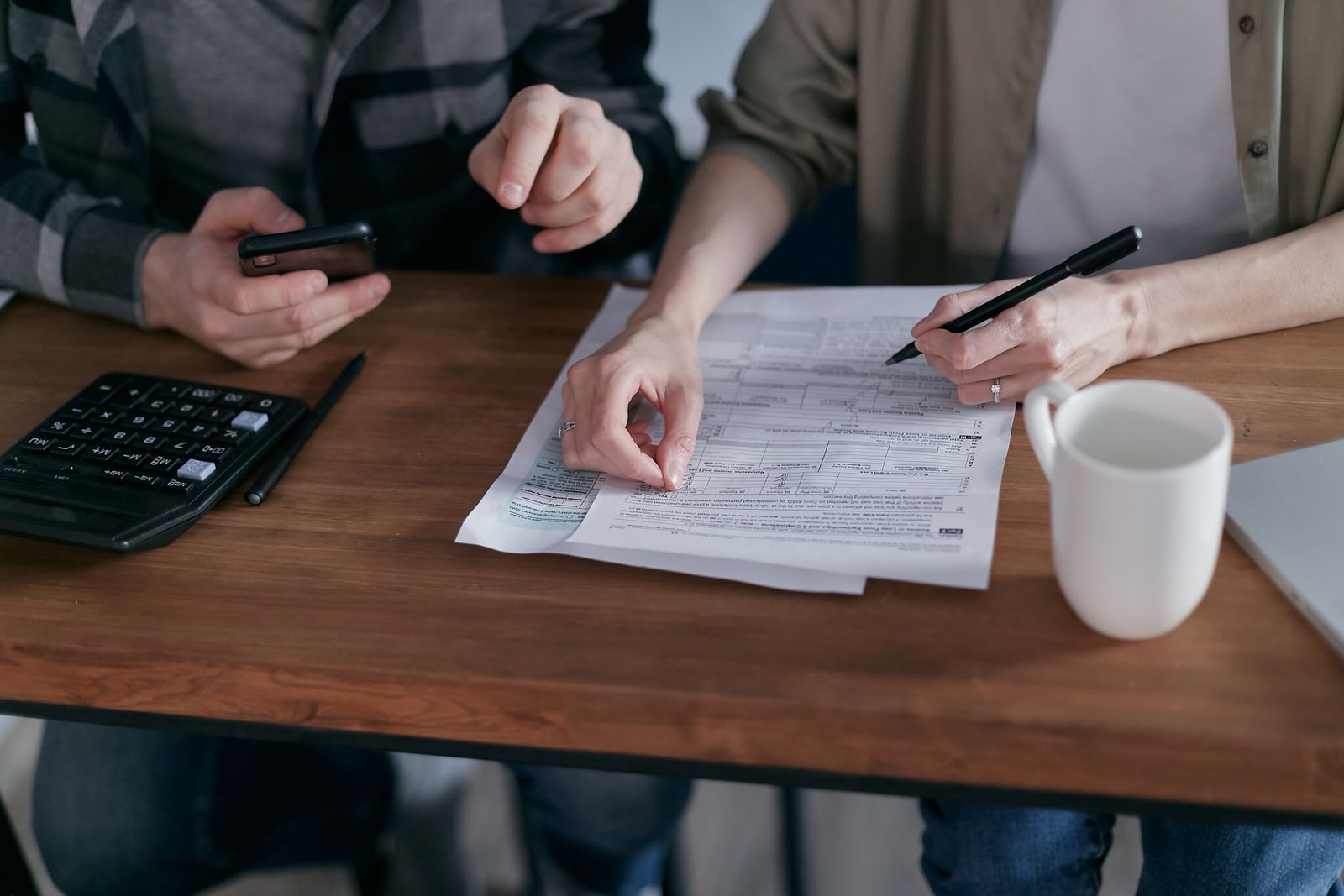 A family reviewing financial documents together