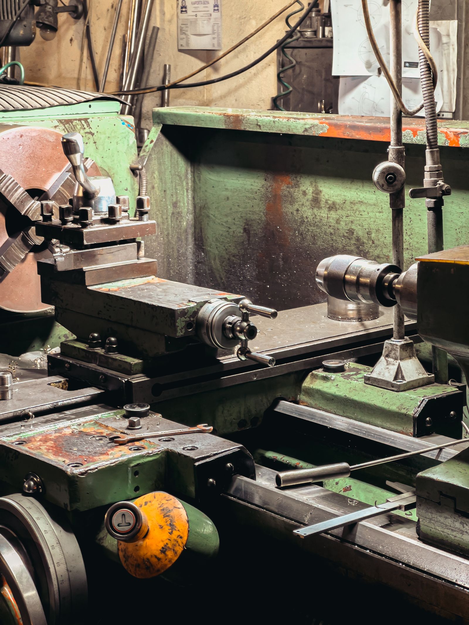 A lathe machine at work in an industrial workshop