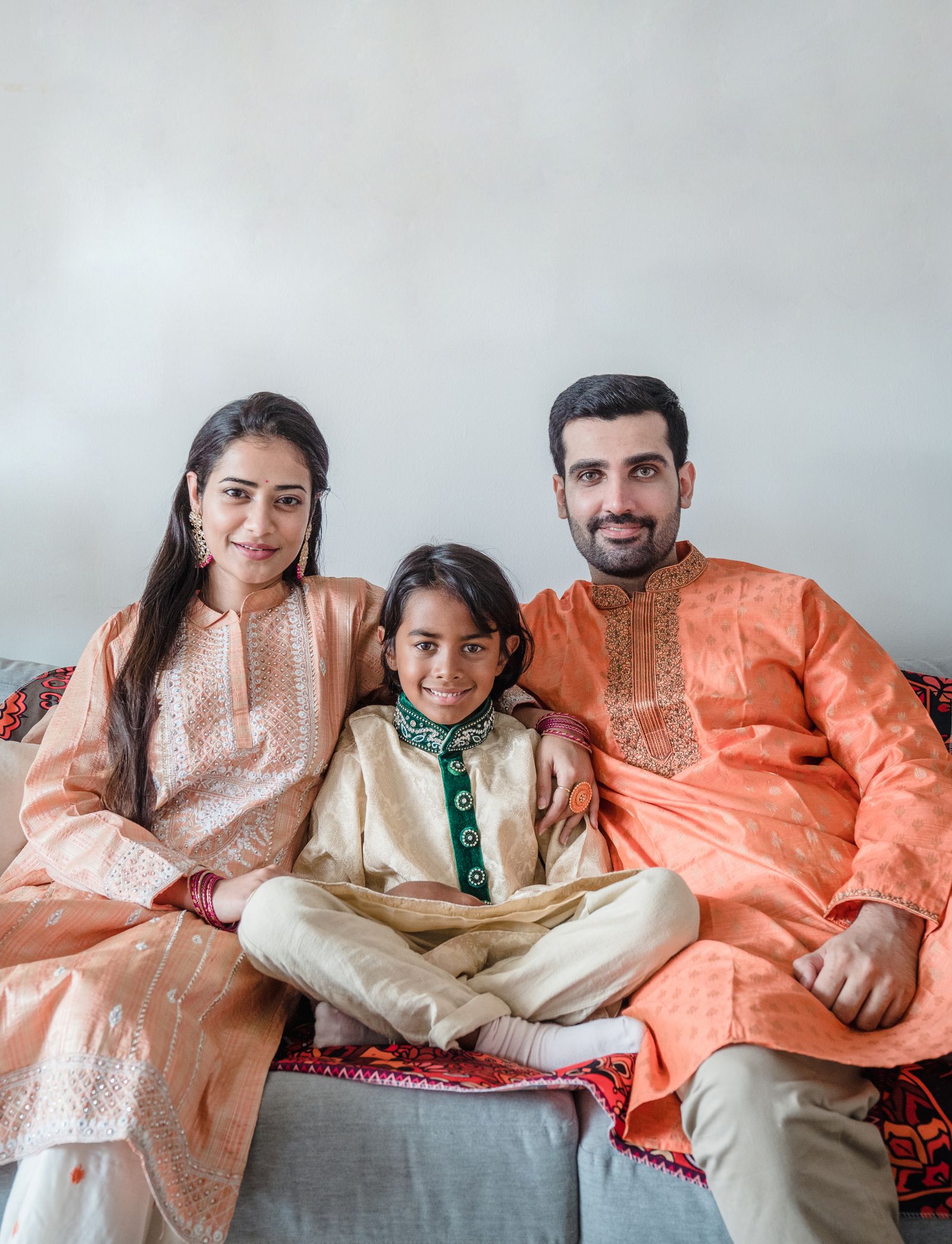 An Indian family sitting together at home